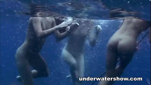 Teen girls swimming naked in the ocean