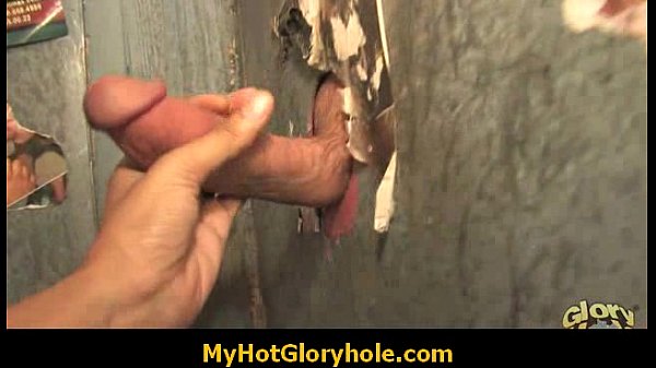 Ebony woman gives interracial gloryhole blowjobs
