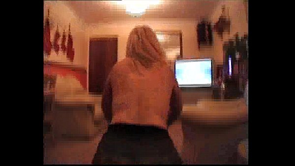 Blonde milf Cathy strips in stockings alone