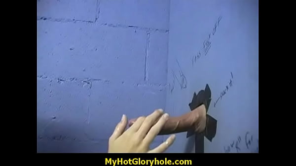 Black woman gives interracial gloryhole blowjob