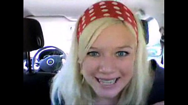 Blonde amateur woman masturbates with fingers in her car