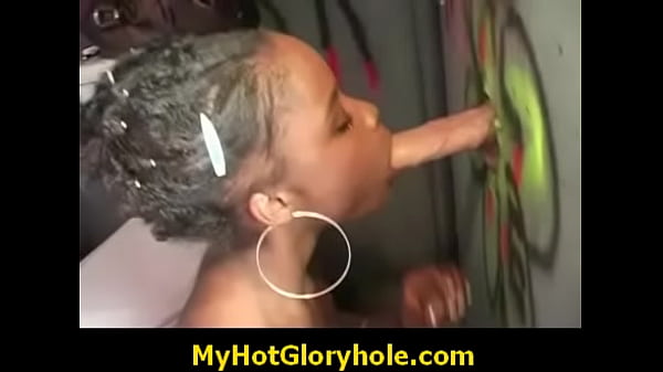 Girl gives anonymous blowjob at a gloryhole