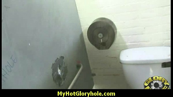 Sexy lady gives interracial blowjob at gloryhole