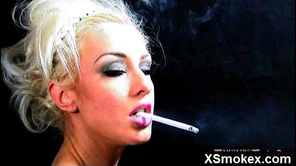 Mature woman smokes a cigarette before getting fucked