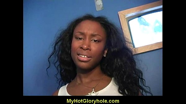 Ebony woman gives interracial gloryhole blowjobs