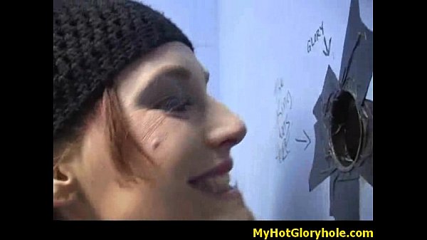 Ebony woman gets black cock through gloryhole for intense interracial blow job