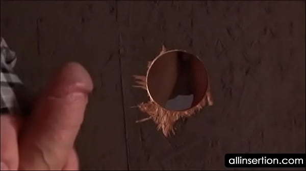 Woman in stockings gets fucked on gloryhole