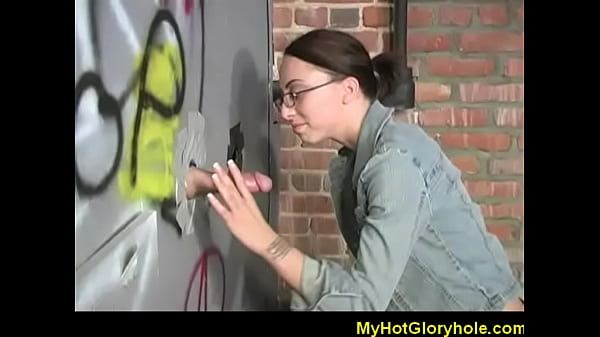 Ebony woman performs interracial gloryhole blowjob with black male