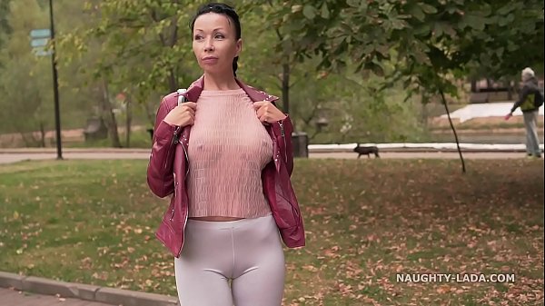 Naughty Lada shows off her cameltoe in see-through leggings and blouse outdoors