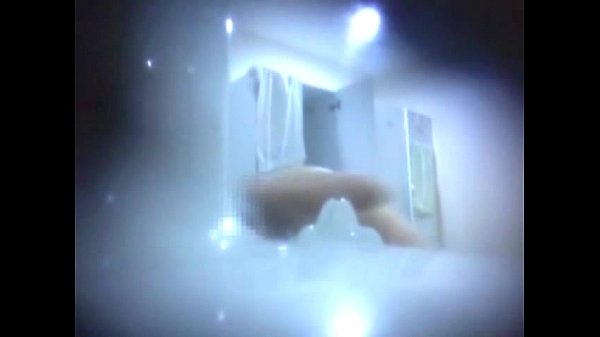 Big tit girl caught on hidden shower cam