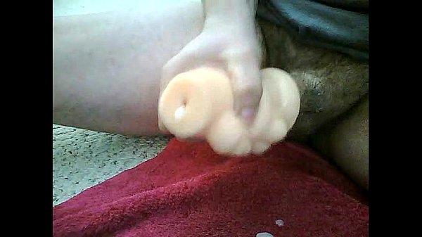 Oiled up amateur soloboy plays with toy