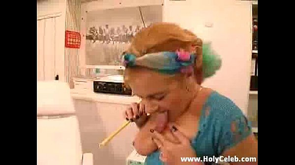 Granny masturbates in stockings