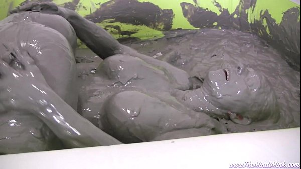 Mindi Mink joins messy red lipstick covered mud bath with blonde girl