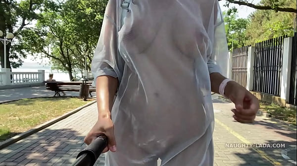 Naughty Lada flashes in transparent dress in public
