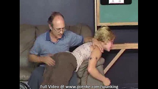 Girl with glasses gets spanked for showing off her red ass