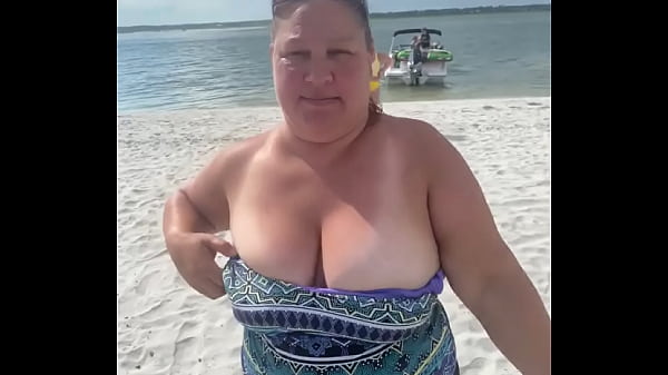 Bbw housewife flashes big tits on public beach with her husband watching