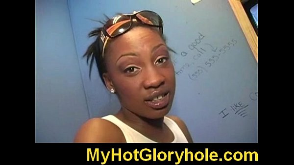 Black chick gives her first gloryhole blowjob