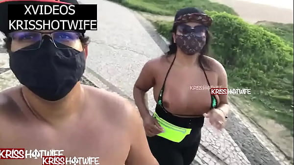 Kriss hotwife flashes big tits on beach