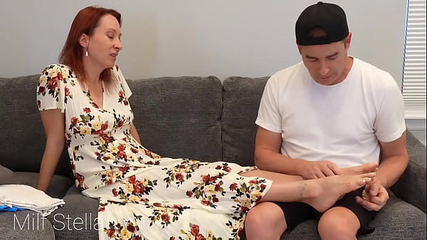 Stepmom Milf Stella gives footjob to Stefano
