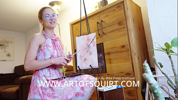 Blonde Miss Daisy Diamond paints solo in glasses