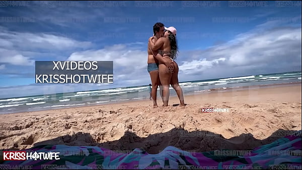 Kriss hotwife flashes big tits and ass in micro bikini on public beach
