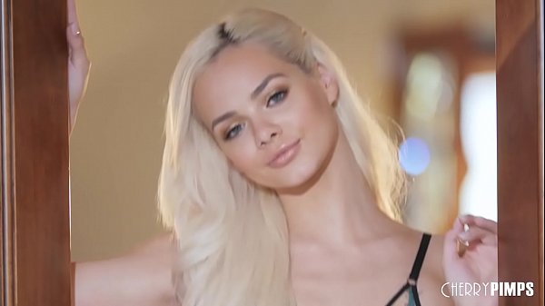 Elsa Jean strips and masturbates with her shaved pussy