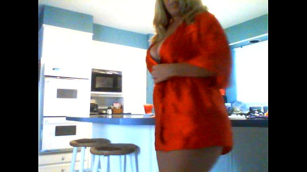 Horny milf has an intense orgasm while playing in the kitchen