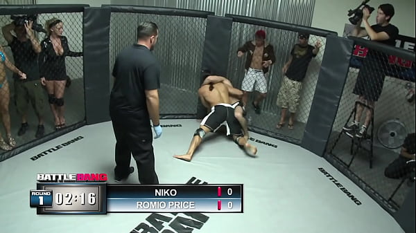 Women fighting in a cage match