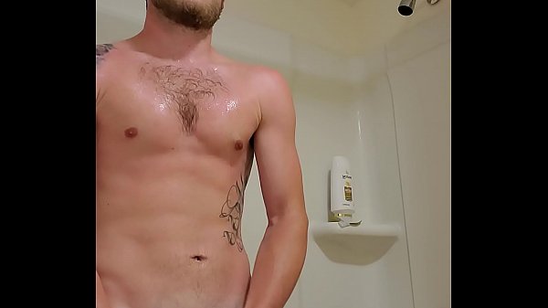 Tattooed solo boy Spencerr Rayne masturbates in shower