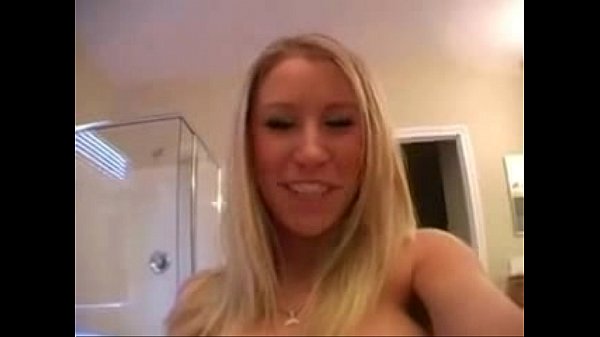 Blonde woman shows her tits on live webcam while using a sex toy