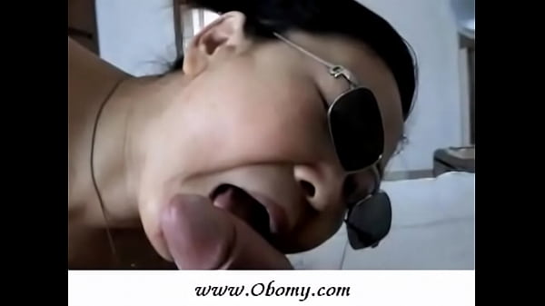 Korean exhibitionist girl strips and gives blowjob at party