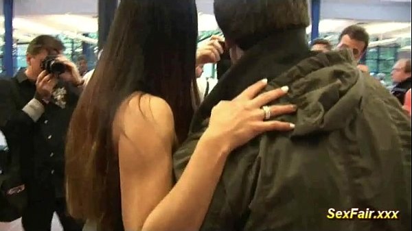 Doll gets turned on by dildo during live sex show at Sexfair stage