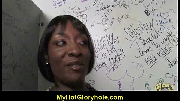 Ebony woman gets initiation blowjob at gloryhole