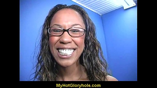 Ebony girl sucks cock at gloryhole