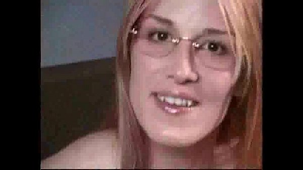 Blonde milf with big tits and glasses gives oily titjob
