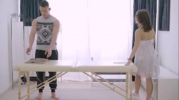 Russian brunette gives masseuse a blowjob