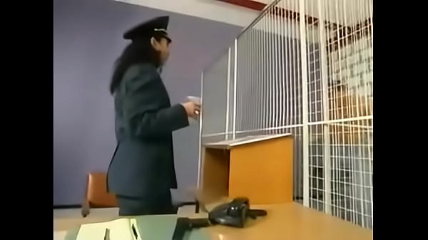 Sexy brunette cop in uniform gets handcuffed and takes cumshot in prison