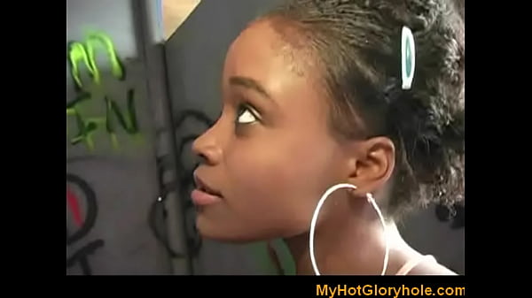 Ebony girl gives interracial gloryhole blowjob