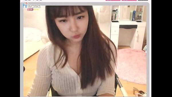 Korean girl plays with toy on webcam
