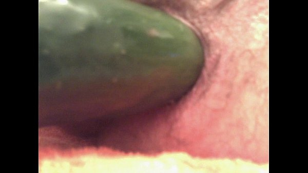 Guy sticks cucumber in his ass for anal masturbation