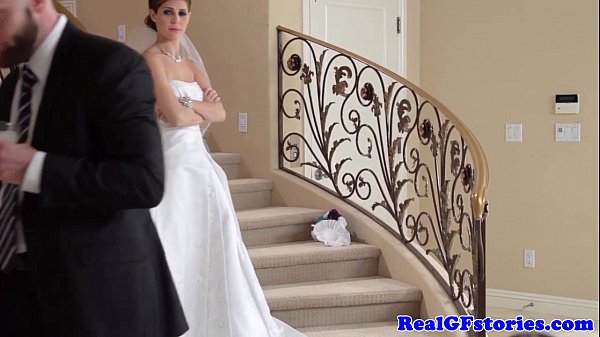 Bride gets facialized by photographer while wearing high heels and lingerie