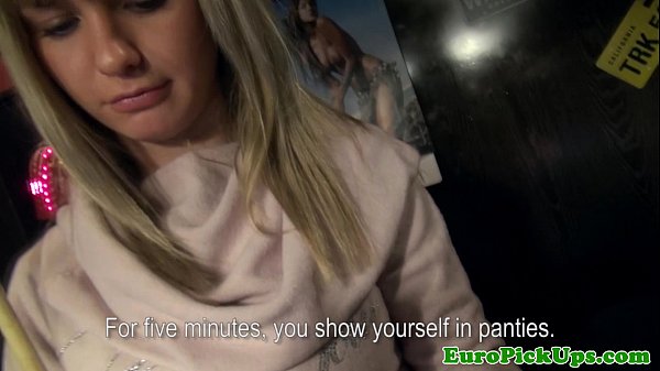 Blonde teen flashes her tits in public while being pulled by a guy