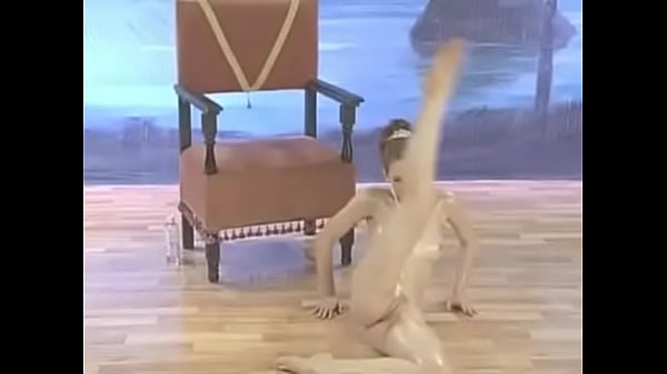 Hot ballerina girl dances seductively to Swan Lake