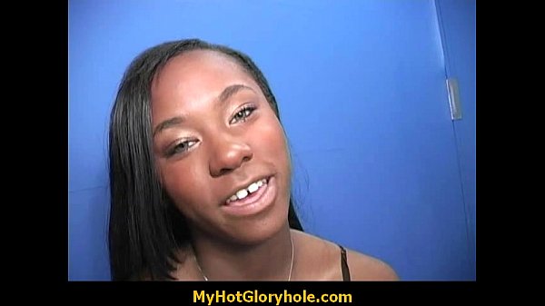 Ebony woman gives interracial gloryhole blowjobs
