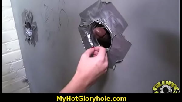 White milf sucks black cock through gloryhole