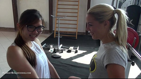 Blonde Sugar Cookie gives blowjob in gym