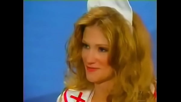 Blonde nurse masturbates with dildo in front of mayor in office