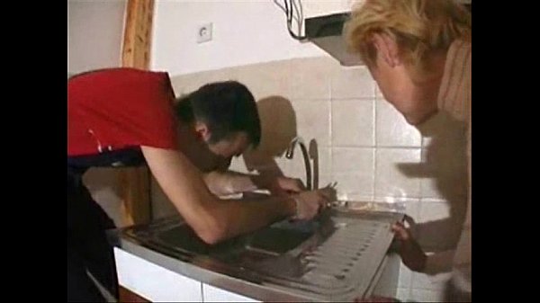 Stepson gets caught by mature blonde granny while fixing sink and gets hardcore blowjob