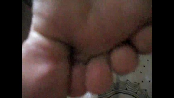 Woman gets cum on her feet during footjob