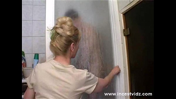 step mom catches step son while taking a shower and gives him a blowjob